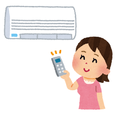 エアコンのスイッチを入れる女性